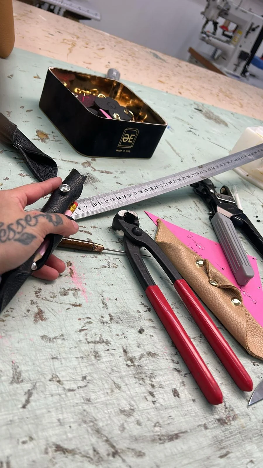 Leather takes shape on the workbench.